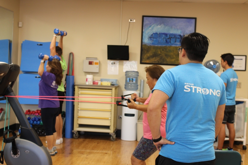 people working out in a room