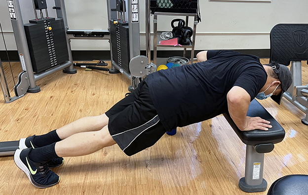 Billy V working out at REHAB