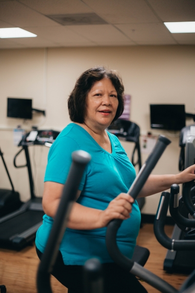 woman on elliptical workout machine