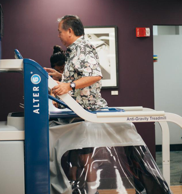 Patient walking on the Alter-G treadmill
