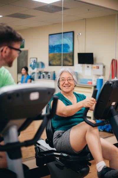 Woman exercising in REHAB Recovery and Rejuvenation class. 