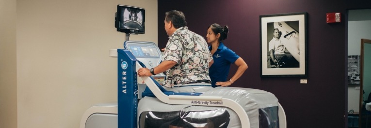 Patient using the Alter-G treadmill