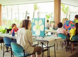Patients participating in a painting class activity