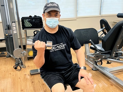 Billy V working out through REHAB's iCare program