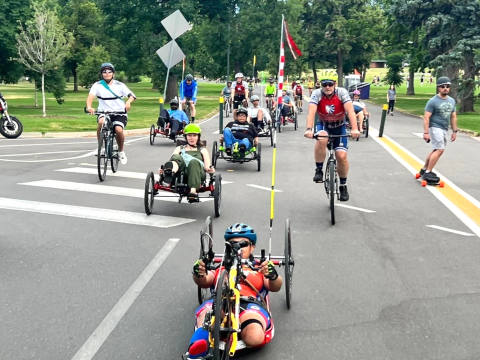 Image provided by Adaptive Adventures. Adaptive cyclers from an Adaptive Adventures cycling event on the mainland.